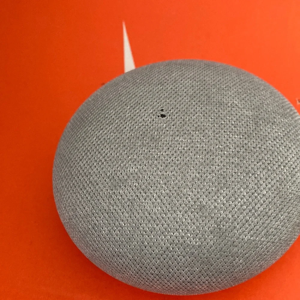 Google home (barely used and charger included)